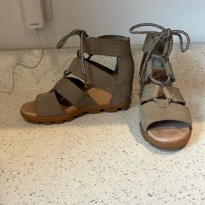 Sorel sandals.  Never worn.  Size 6.5.  Soft sage green